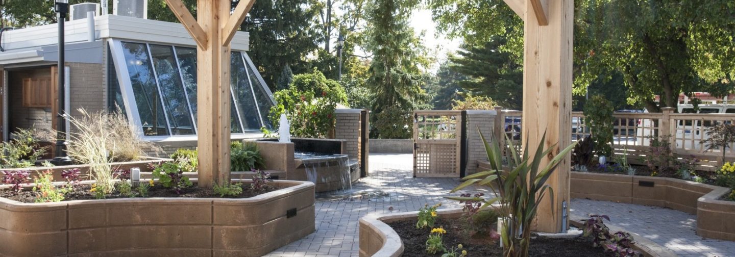 Outdoor patio with walled garden islands
