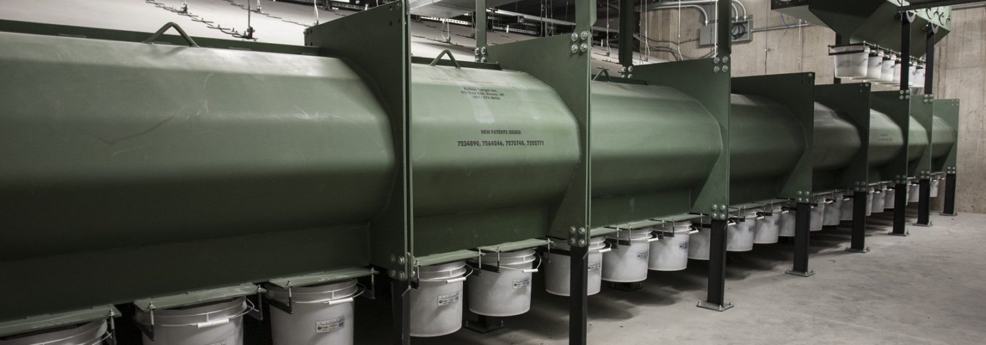 Shooting gallery bullet catcher with buckets underneath