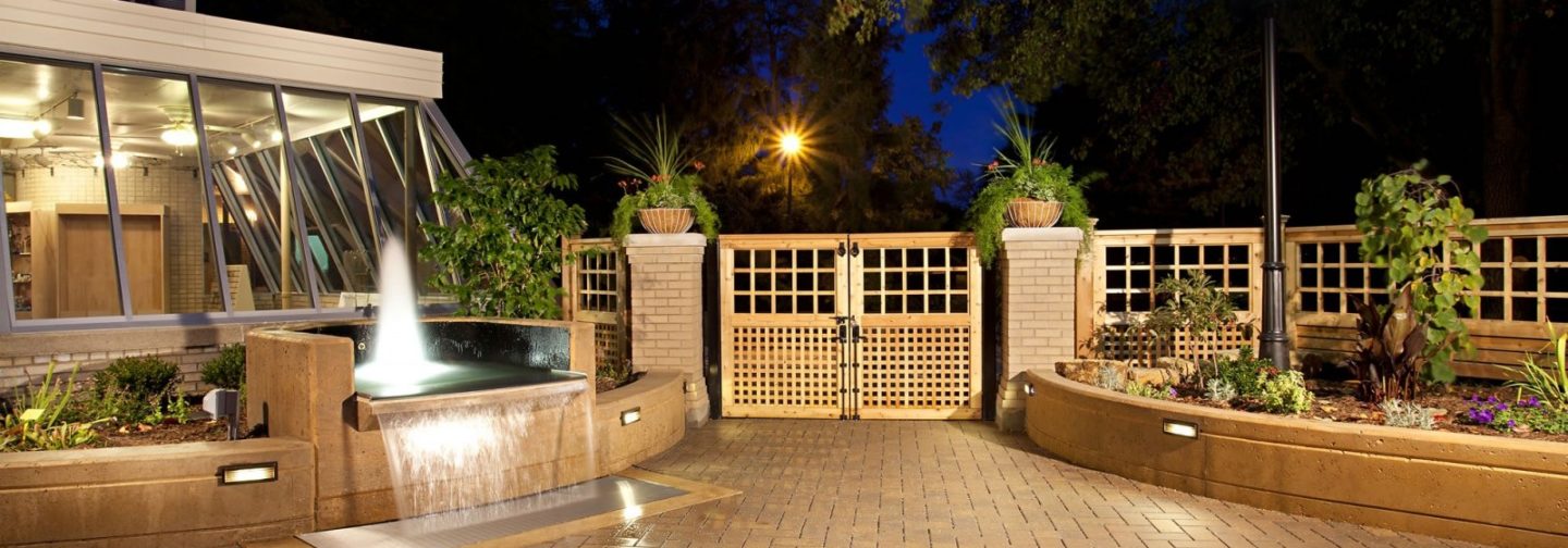 Patio garden entrance with wooden gate