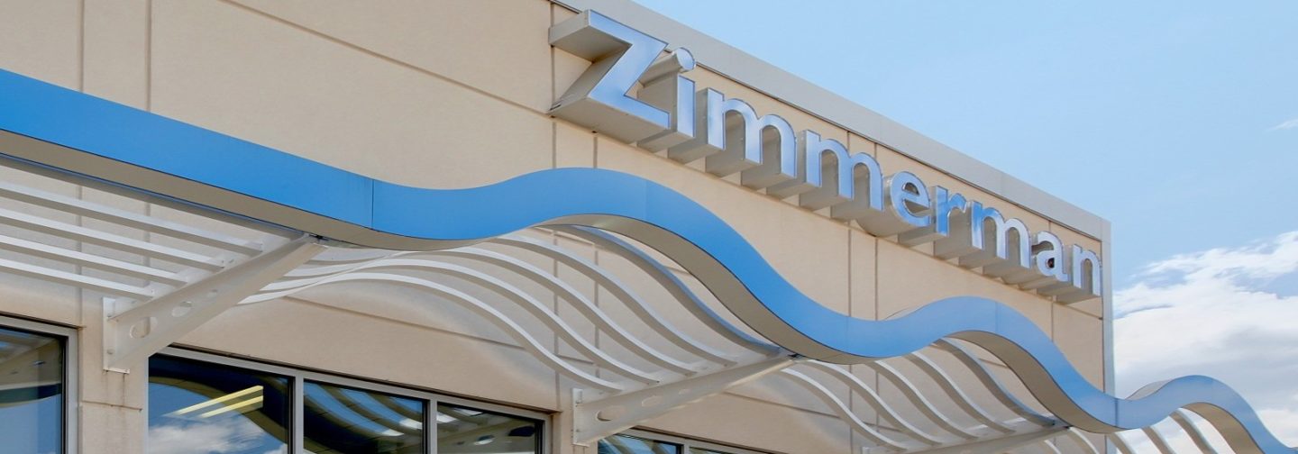 Exterior building shot with Zimmerman text on wall